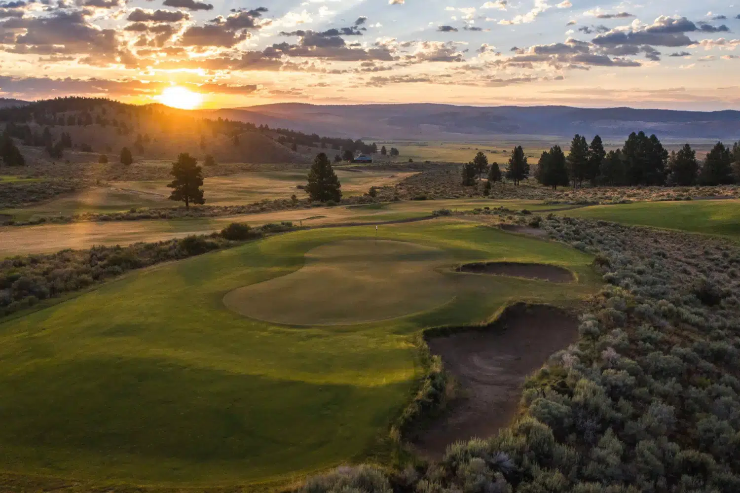 Sunset over a golf course at Silvies